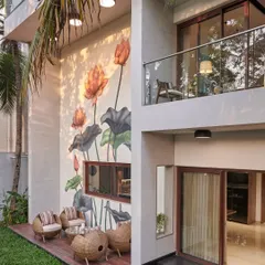 A touch of tranquility for a private residence. This serene lotus mural turns a garden patio into a peaceful retreat, showing how custom wall art can completely transform the feeling of a home.