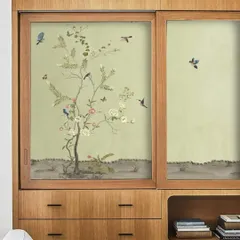 Here, I used a delicate, nature-inspired wallpaper with birds and trees on sliding wardrobe doors. The pastel green background and gentle motifs create a calming atmosphere, integrating the furniture with the room's overall serene theme.