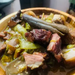 This is smoked pork from Nagaland, cooked with potatoes and fresh vegetables. I also made a pennywort salad with roasted chillies and fermented fish to go with it.