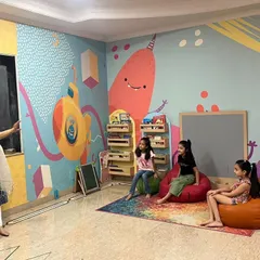 Our library is designed to be a happy, engaging space. With colorful murals and comfy bean bags, children have plenty of room to relax and listen during our story sessions.