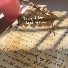 Instead of a long text message that gets lost in the chat history, try sending a letter. This is a close-up of the coffee-stained paper I use to give each custom letter a warm, nostalgic feel.
