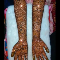 An example of my intricate bridal work, covering the full arms with dense patterns and a touch of sparkle for an extra special look.