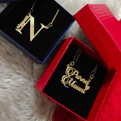More examples of my custom name necklaces. I can create designs with just an initial or with two names intertwined, perfect for couples.