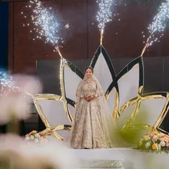 A truly magical bridal entry. We designed this custom lotus float with cold pyros to create a divine and ethereal moment for the bride as she made her way to the stage.