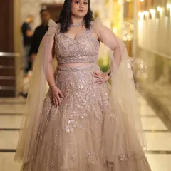 A stunning solo shot of Neelam at her reception. The glamorous makeup and beautiful gown come together for a show-stopping look.
