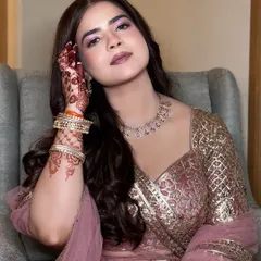 My 'Rokafied' bride Navya, looking absolutely lovely. The soft pink eyeshadow and matching lip colour create a harmonious and gentle look.