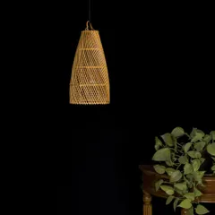 The same conical bamboo pendant, unlit. Notice the subtle variations in the bamboo and the neat finish at the top, details that speak to its artisanal origins.