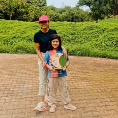 Posing with my daughter after a hilly half marathon. She is my biggest cheerleader and my reason for pushing to be the strongest version of myself.