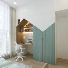 This house-shaped wardrobe and desk unit adds a playful architectural element to a child's room. It provides a defined space for study and keeps the room organized and tidy.