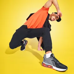 A high-energy shoe campaign requires dynamic poses and bold colors. I used a stark yellow background and a low-angle shot to make the sneakers the hero of the image, emphasizing their design and capturing a sense of movement and athletic style.