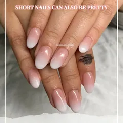 A beautiful baby boomer (ombré French) manicure on a shorter, natural nail length. It's a timeless and elegant look that elongates the fingers.