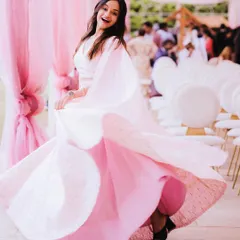Feeling like a Barbie girl in this beautiful pink outfit for a daytime event. The twirl was mandatory! My style is all about being vibrant, fun, and fitting the mood of the celebration.