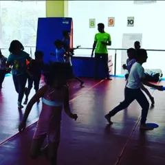 Here, the kids are playing "Tunnel Tag," a high-energy game that gets everyone running and laughing. Group games are a central part of my party plan to encourage teamwork.