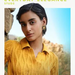 The 'Everyday Elegance Studs' from the Numisma collection are perfectly named. Paired here with a casual knit top, they demonstrate how a simple, well-designed piece can elevate your daily style.