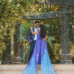 Creating a dramatic and fashionable pre-wedding photo with a long, flowing purple gown. I use creative angles and poses to make you look and feel like you're on a magazine cover.