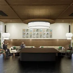 Another perspective of the 'Inhabiting The Forest' lounge, highlighting the seamless connection to the outdoors through floor-to-ceiling glass. The layout is designed to facilitate conversation and provide a luxurious and comfortable experience for visitors.