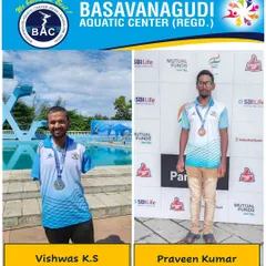 Vishwas K.S and Praveen Kumar with their silver and bronze medals from the 24th National Para-swimming Championship.