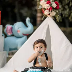 Nothing says "first birthday" quite like a messy cake smash. I make sure these sessions are all about fun, capturing the surprise and delight as your little one enjoys their first taste of birthday cake.