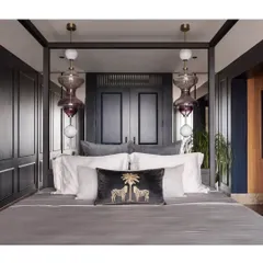 A master suite should be a sanctuary. For this high-rise apartment, we created a moody and luxurious retreat with a custom four-poster bed, deep blue paneling, and exquisite blown-glass pendant lights. The design balances opulence with personal comfort, creating a space that feels like a private escape from the city below.