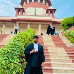 Standing before the Supreme Court, ready to argue for my client's rights. Practicing here requires meticulous preparation and an unwavering commitment to justice.