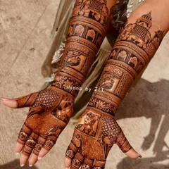 A truly royal design featuring story bands of peacocks and elephants. The intricate details and symmetrical patterns create a stunning effect that extends up the arms.