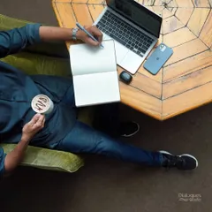 Work should be comfortable. That's why I've filled my space with cozy seating, a laptop-friendly table, and a warm cup of coffee to keep you going through your tasks.