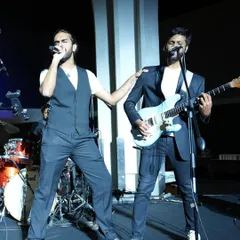 Aryaman and Joshua sharing a moment on stage. Our interactive performances are all about engaging with the audience and making them feel like part of the show.
