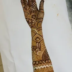 Another incredible design from a student early in the course. The combination of delicate vines, bold fillers, and a clean wrist cuff design is just beautiful.
