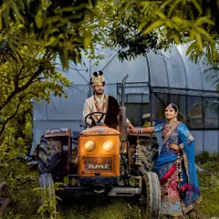 A unique and fun wedding portrait featuring the couple posing with a vintage tractor. I love incorporating personal or quirky elements that make your wedding photos truly one of a kind.