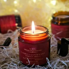My 'Vanilla Gourmand' candle, lit and glowing warmly. This classic, sweet scent is a crowd-pleaser and a safe, elegant choice for large-scale event gifting where tastes may vary.
