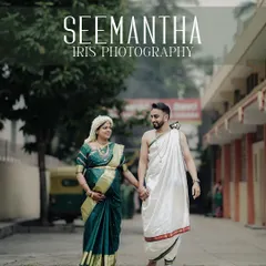 A candid shot of the couple walking together during their Seemantha ceremony. It shows their partnership and joy as they step towards parenthood.