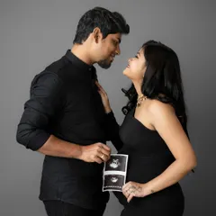 Sharing the first glimpse of your baby. Incorporating the ultrasound picture into your couple's session makes the connection to your little one feel even more real and beautiful.