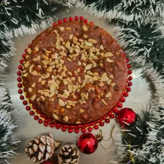 You can't beat a classic Christmas plum cake. This is my traditional rich fruit cake, packed with nuts and dried fruits. I offer both rum-soaked and non-alcoholic versions to suit everyone's taste.