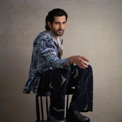 For Aditya Seal's FHM India cover story, I designed this look to feel both relaxed and luxurious. The printed tuxedo jacket is paired with a silk shirt and patterned trousers, creating a cohesive statement that is effortlessly cool.