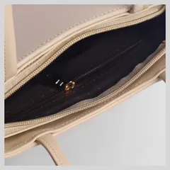 A close-up of the interior zipper and fabric, highlighting the quality of the materials.