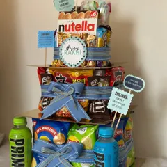 Another angle of the epic Food Tower Hamper. It's the perfect way to say "Happy Rakhi" and celebrate your bond with a mountain of their favorite treats.