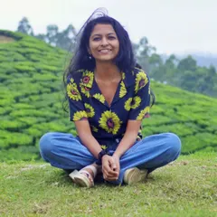 A moment of pure joy amidst the tea gardens of Munnar. My practice is rooted in finding this kind of simple happiness and connection, embracing the world around us with an open heart.