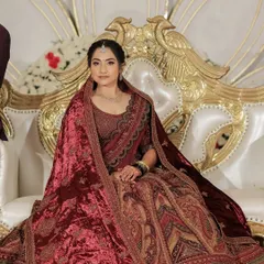 For this bride's grand reception, we went for a regal and glamorous look. I styled her in a stunning velvet lehenga, creating a makeup look with a bolder lip and defined eyes that complemented the richness of her outfit and the evening's celebrations.