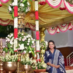 Posing at a traditional wedding muhurtham stage I designed. My philosophy is that success comes from what you do consistently, not just occasionally.