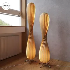 These sculptural floor lamps are a great example of functional art. They provide soft, ambient light while also serving as a design feature, perfect for adding warmth to a restaurant's waiting area or a creative office corner.