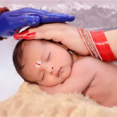 A conceptual photoshoot depicting a newborn blessed by Lord Shiva. This theme uses creative props and editing to create a powerful and divine image for your baby.