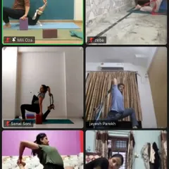 My online students use props like blocks and straps to assist them in deep stretches, just as we would in the studio.