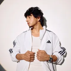 Another shot from the 2025 press kit. All white, clean look.