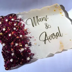 A beautiful 12x9 inch nameplate made with preserved red rose petals and pearls.