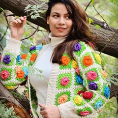 Our granny square jacket, adorned with colorful 3D flowers, is a celebration of vibrant, wearable art. It’s a modern take on a classic crochet technique, perfect for those who love to wear their personality.