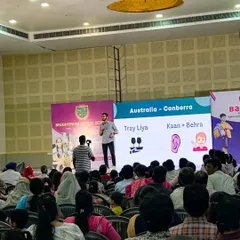Here you can see one of our unique memory techniques in action at a live seminar in Kishangarh. We use visual association, like connecting 'Australia' with 'Tray Liya' and 'Canberra' with 'Kaan+Behra', to make information stick. This is how we make learning fun and unforgettable.