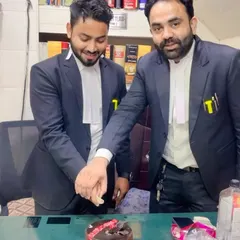 Cutting the cake with my mentor to celebrate my band ceremony. These moments of recognition from seniors are a great source of motivation.