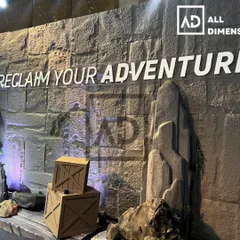 This large-scale wall for an event or commercial space is clad in PU stone panels. It provides a powerful, adventurous backdrop that looks and feels like a real rock face.