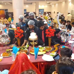 Our team meticulously arranges the Shahi Table, ensuring every dish is perfectly placed before the guests arrive. This setup includes our signature swan-shaped centerpieces.