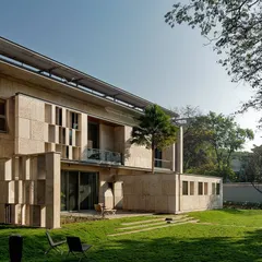The Aqua Grid house, a private residence where the design was organized around preserving existing trees. A series of water courts, reminiscent of temple tanks, flow through the house, integrating the indoor and outdoor spaces.